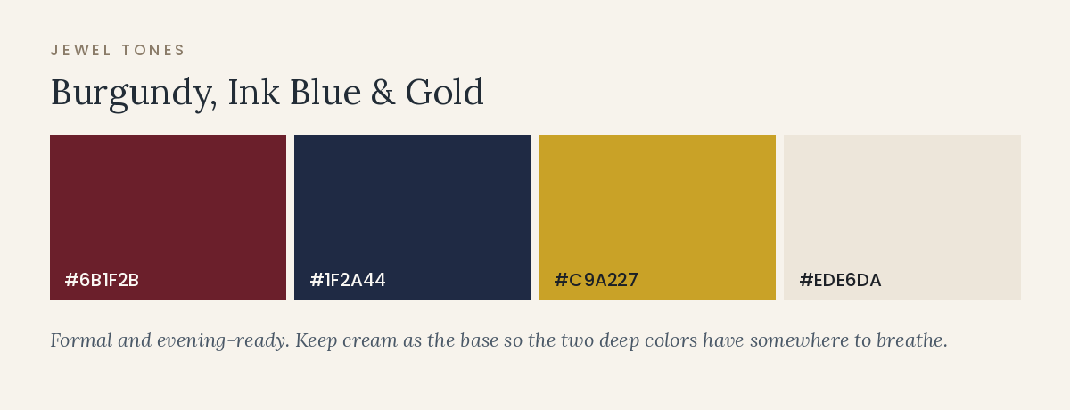 November wedding color palette in burgundy, ink blue, and gold tones