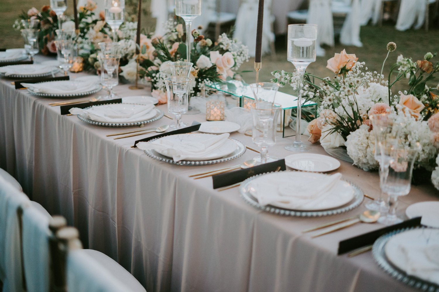 Wedding Linen Rental: Hidden Costs and Fees the Quote May Not Show 16 Decorated table setting for a wedding celebration