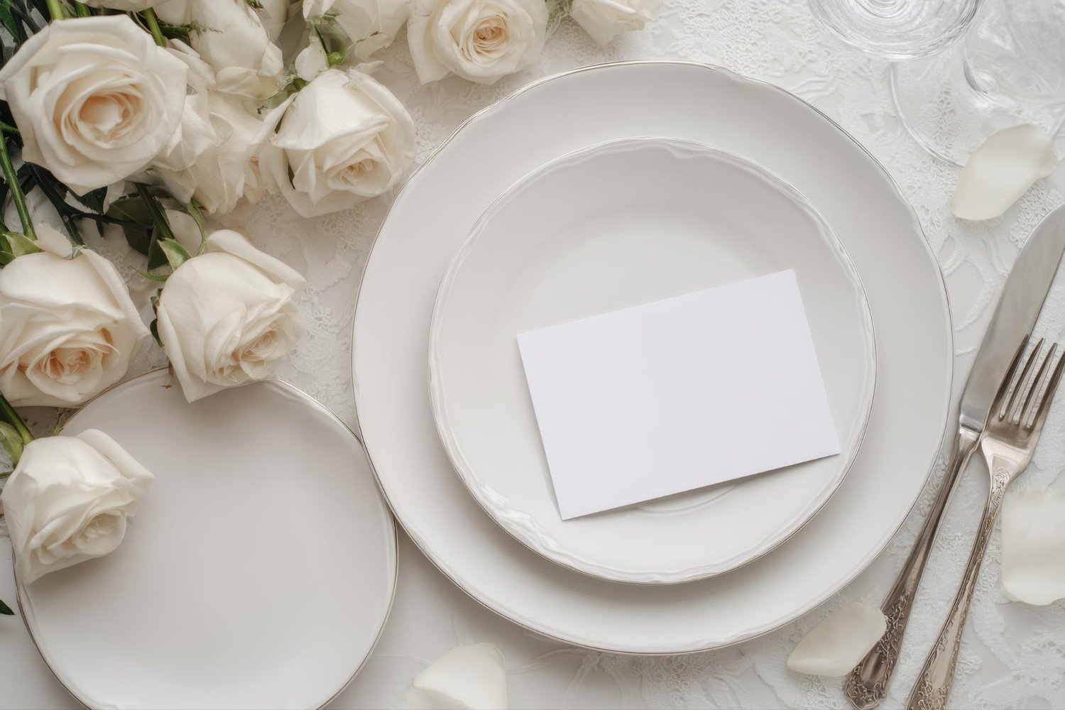 Plus-One Etiquette for Weddings: Who Gets Invited and Who Doesn't 14 Wedding reception table setting with a blank place card and white roses